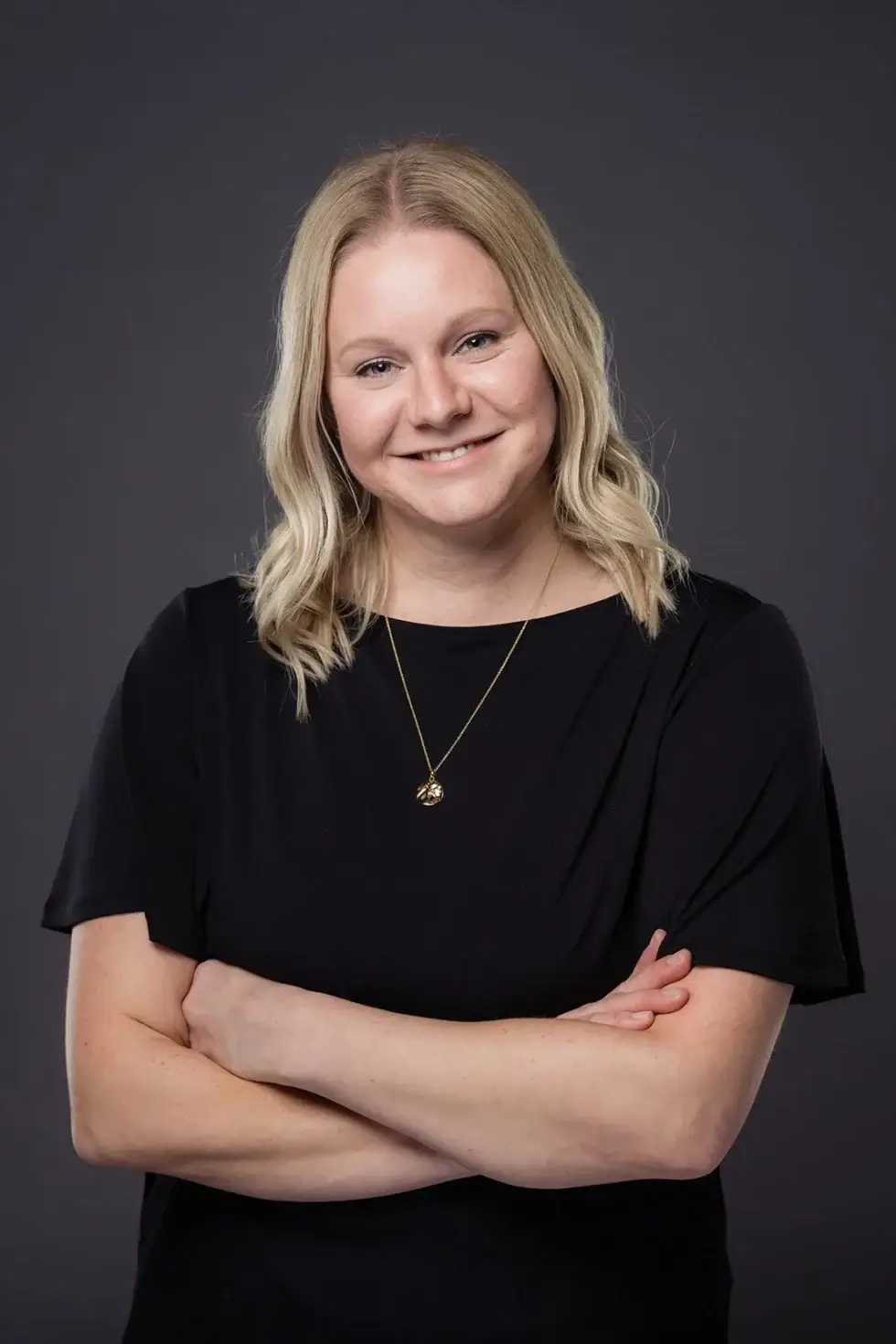 Sik_Pics_COMM_StudioDance-42 a woman in black dress posing for a picture